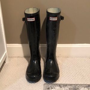 Black glossy tall hunter boots